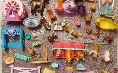 Vintage Hasbro Littlest Pet Shop animals along with their cages, pools, habitats, accessories, bowls, treats, and (of course) toys